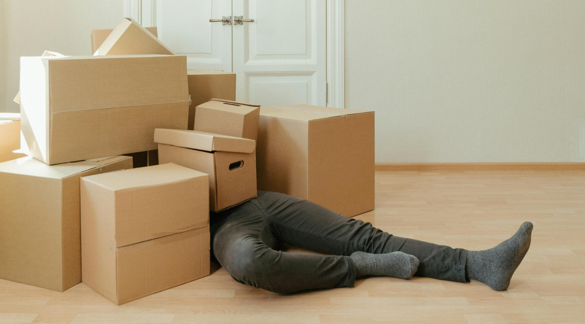 A stack of moving boxes of different sizes